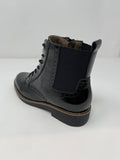 Fugitive Flat Ankle Boot. Elastic Panel. Inside Zip Opening.