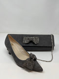 Marian Clutch Bag With Diamanté Bow Trim.